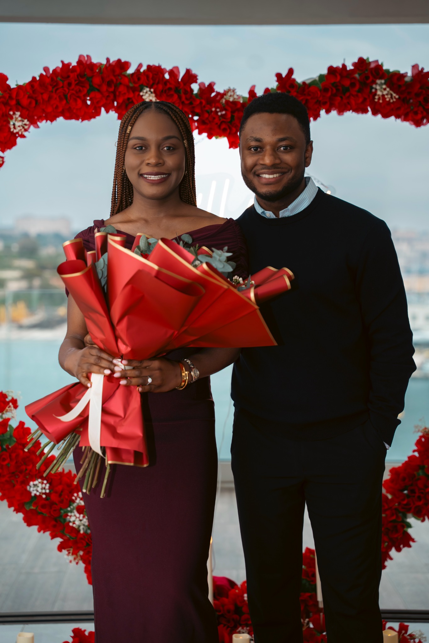 Uchechukwu and Similoluwa smiling together after their proposal